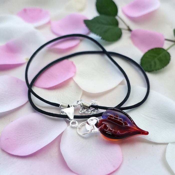 White, Blue & Red Artisan Heart offset pendant on black satin cord