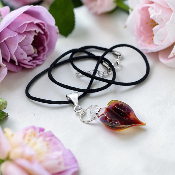 Fire Orange Artisan Heart offset pendant on black satin cord