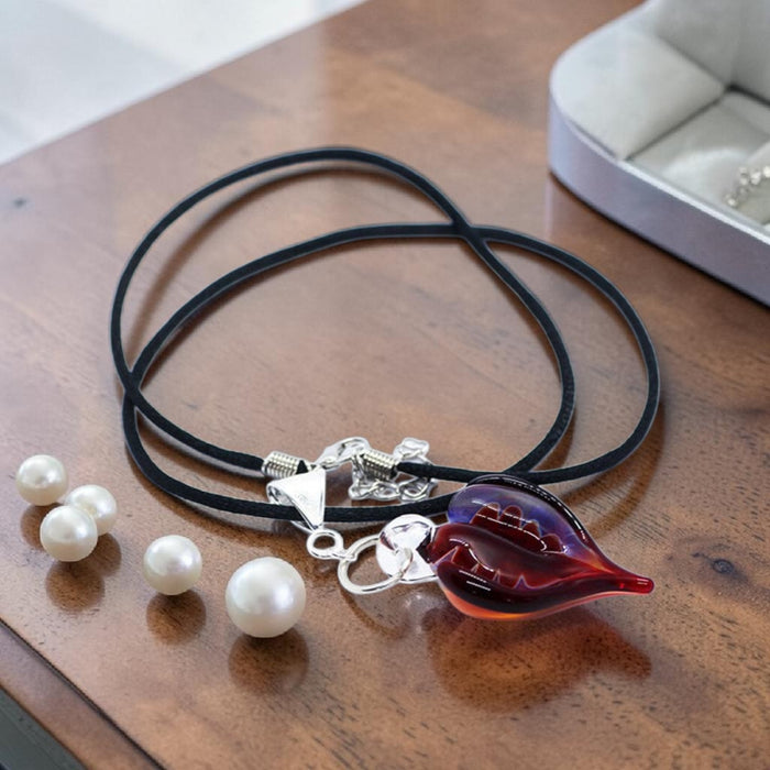 Red Artisan Heart offset pendant on black satin cord