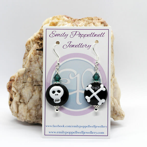 Mismatched Halloween black & white skull and cross bones, green crystals Artisan Glass earrings