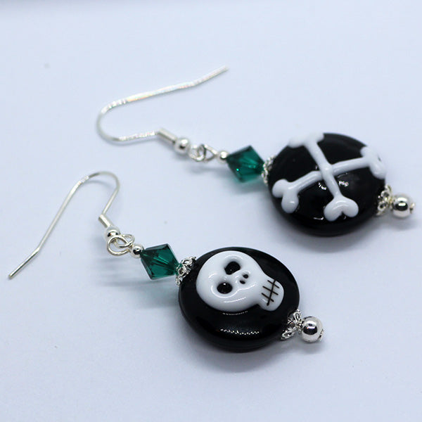 Mismatched Halloween black & white skull and cross bones, green crystals Artisan Glass earrings
