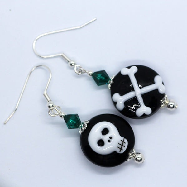 Mismatched Halloween black & white skull and cross bones, green crystals Artisan Glass earrings
